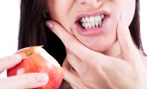 Perché un dente fa male quando viene premuto, premuto e morso