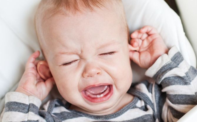 Coughing and runny nose in teething in children: symptoms, causes, how to treat