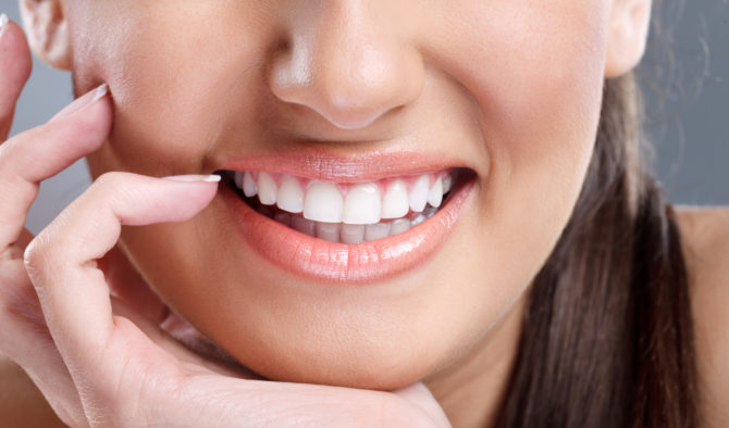Snow-white teeth after bleaching at home